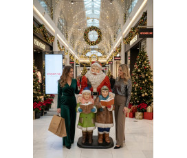 Stor Jultomte med barn i glasfiber